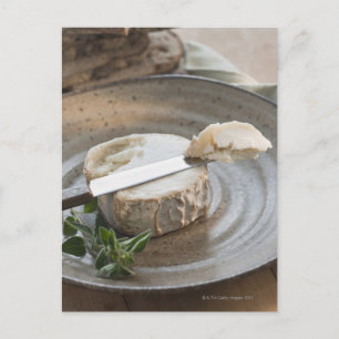 Brie cheese on plate postcard
