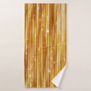 Bright abstract golden background with glitter bath towel