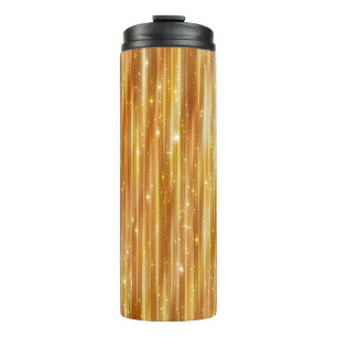 Bright abstract golden background with glitter thermal tumbler