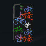 Bright Bicycles Pattern Monogram Samsung Galaxy Case<br><div class="desc">Here's a fun case that any bicyclist would love! Brightly coloured red,  blue,  purple and green bicycles are scattered across a black background. Your two letter monogram stands out in white.</div>