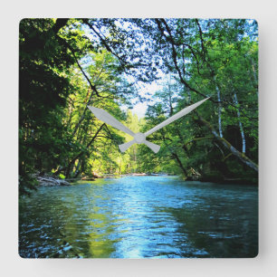 Bright Blue River Under Green Trees in Washington Square Wall Clock