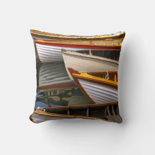 Bright coloured boats at the Wooden Boat Centre Cushion