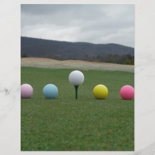 bright coloured Golf Balls on a mountain