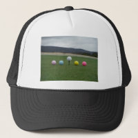 bright coloured Golf Balls on a mountain