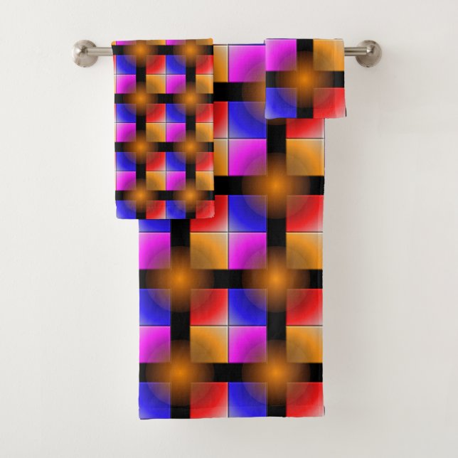 Bright coloured squares on black background bath towel set (Insitu)