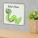 Bright Green Smiling Snake White Eyes Green Dots Wooden Box Sign<br><div class="desc">This rustic wood block can be hung on wall or stands on its own has a smiling cartoon snake who is bright green with a yellow bellow and big white eyes.  Vibrant green dots on a white background. Customise the text with the template.</div>