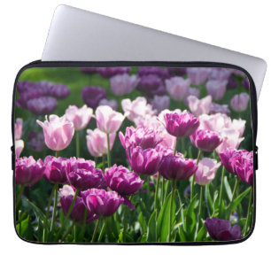 Bright lilac and pink tulips on a sunny day  laptop sleeve