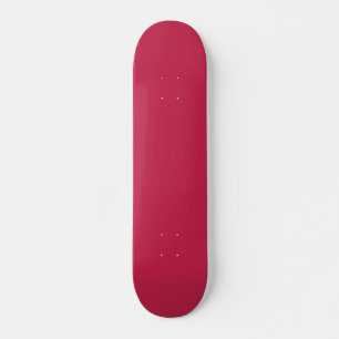 Bright maroon (solid colour) skateboard