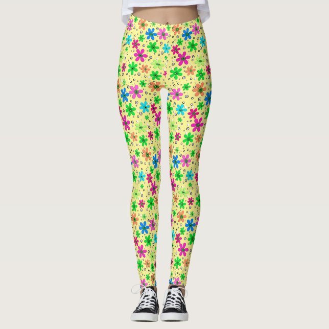 Bright multi-coloured chamomile flowers on a yello leggings (Front)