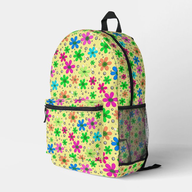 Bright multi-coloured chamomile flowers on a yello printed backpack (Back Corner Right)
