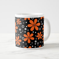 Bright orange flowers on a black background with w