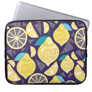 Bright pattern of lemons and cloves on a dark blue laptop sleeve