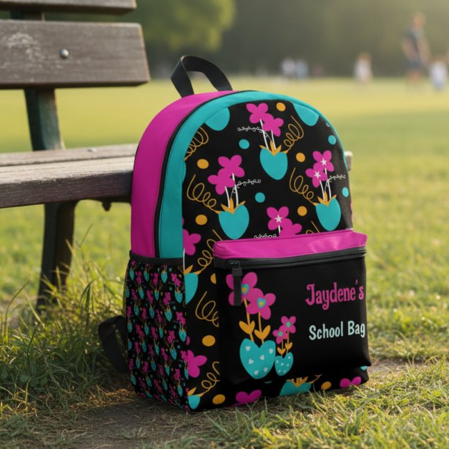 Bright Pink And Teal Whimisical Printed Backpack (Big florals, bold vibes, this backpack turns every school run or day trip into a style moment.)