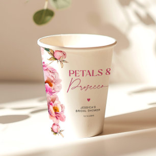 Bright pink floral petals and prosecco bridal paper cups