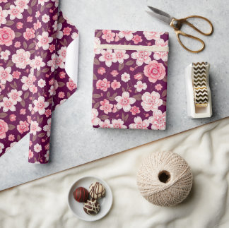Bright pink flowers pattern on purple wrapping paper