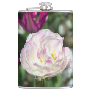 Bright pink tulips on a sunny day   hip flask