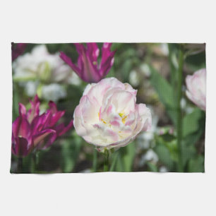 Bright pink tulips on a sunny day tea towel