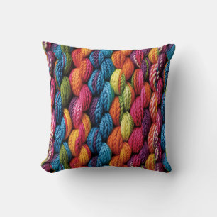 Bright rainbow yarn cushion
