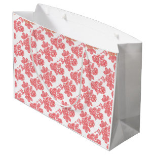 Bright red and pink floral wrapping paper featurin large gift bag