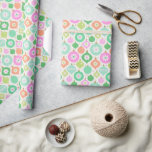Bright Retro Christmas Ornaments Wrapping Paper<br><div class="desc">A bright,  retro design featuring mid-century modern style Christmas ornaments. These fun ornaments are decorated in trendy chequerboard patterns and daisies. Pastel colours include; pink,  green,  turquoise,  teal,  orange and lime green on an off-white background</div>