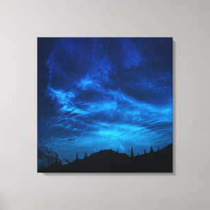 BRIGHT STARS IN A DARK AND BLUE SKY CANVAS PRINT