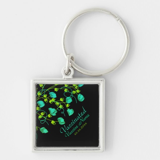 Bright teal and lime green floral key ring (Front)