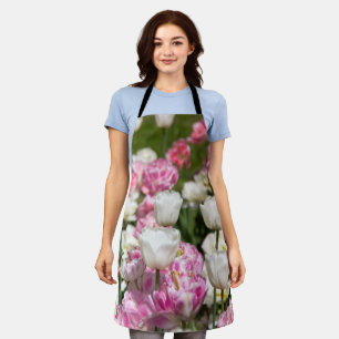 Bright white and pink tulips on a sunny day apron
