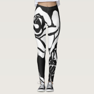 Bright white woodcut rose on a black background leggings