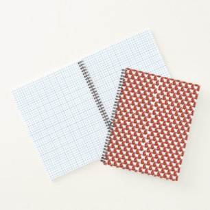 Brightly coloured wrapping paper with a festive pa notebook