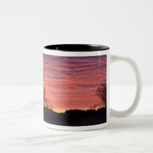 Brilliant sunset reflects into the Calamus River Two-Tone Coffee Mug