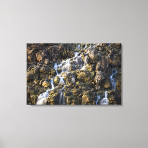 Brine falls from volcanic rock drop off canvas print