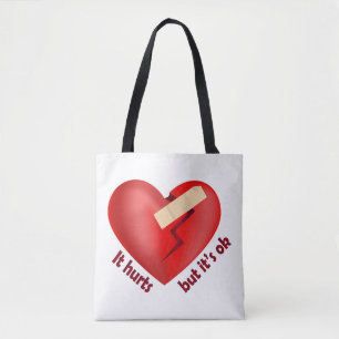 Broken heart healed with patch and life quote tote bag