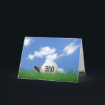 Brother's birthday golf ball in grass card<br><div class="desc">White golf ball in green grass with golf club and sky background for brother's birthday.</div>