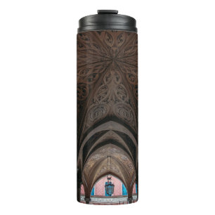 Brown and black wooden building interior thermal tumbler