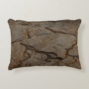 Brown and black wooden surface decorative cushion