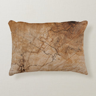 Brown and black wooden surface decorative cushion