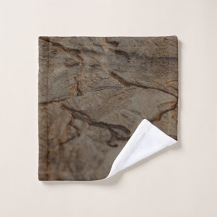 Brown and black wooden surface wash cloth
