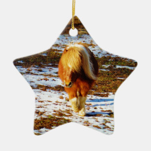 Brown and cream miniature horse in the snow. ceramic tree decoration