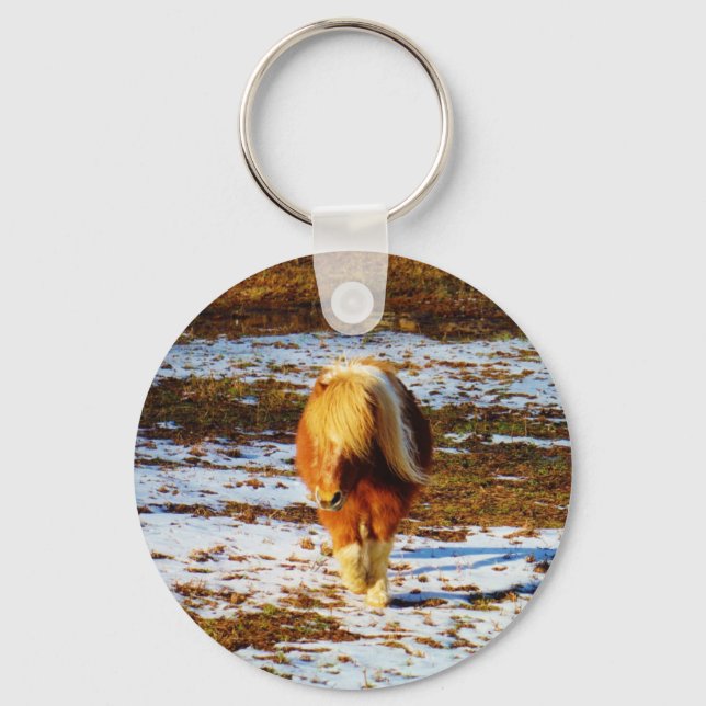 Brown and cream miniature horse in the snow. key ring (Front)