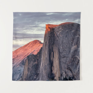 BROWN AND GRAY ROCK FORMATION UNDER GRAY CLOUDS TAPESTRY