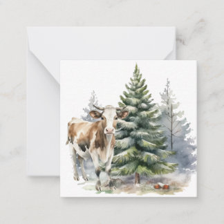 Brown and White calf in Front of a Pine tree Card