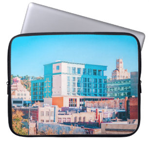 BROWN AND WHITE CONCRETE BUILDING UNDER BLUE SKY LAPTOP SLEEVE