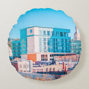BROWN AND WHITE CONCRETE BUILDING UNDER BLUE SKY ROUND CUSHION