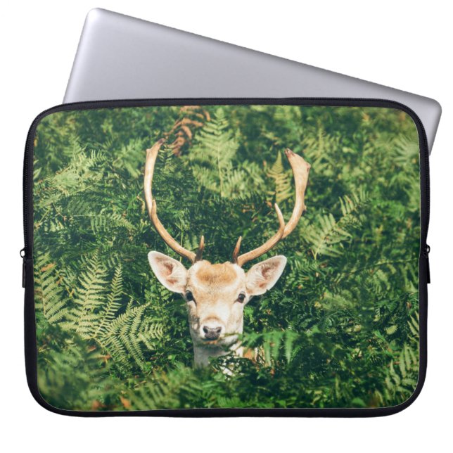 BROWN AND WHITE DEER SURROUNDED BY GREEN PLANTS LAPTOP SLEEVE (Front)