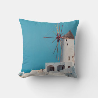 Brown and white windmill cushion