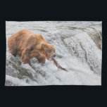 Brown Bear Catches Red Salmon Tea Towel<br><div class="desc">Brown bears fish for red salmon at the falls of the Brooks River,  Katmai National Park,  southwest,  Alaska.</div>