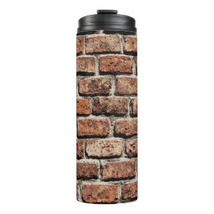 Brown brick wall on daylight thermal tumbler