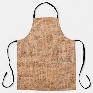 Brown burlap laying on white sheet. Abstract backg Apron