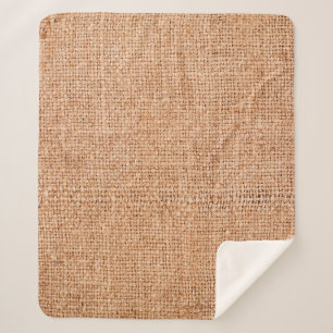 Brown burlap laying on white sheet. Abstract backg Sherpa Blanket