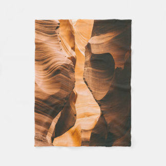 Brown cave under clear sky fleece blanket